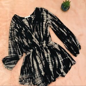 The Impeccable Pig black and cream romper size L.